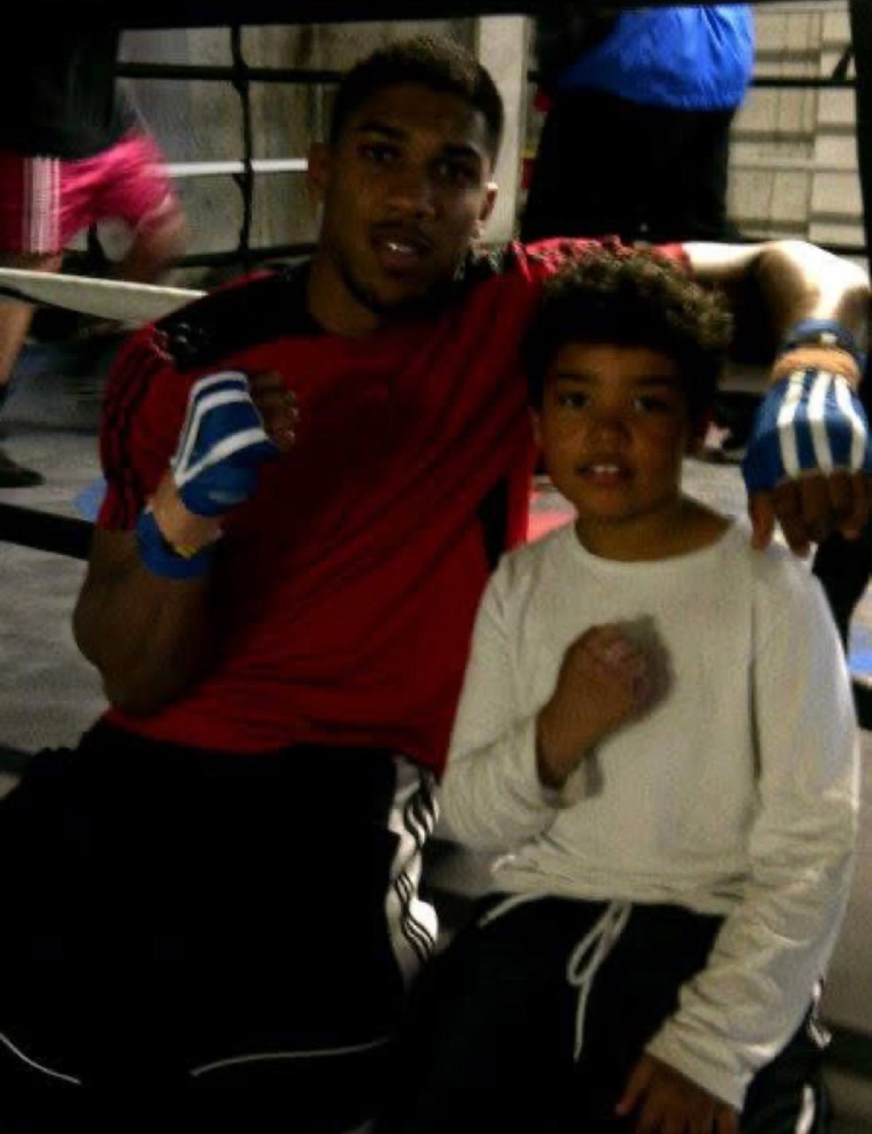 Young Jacob Johnson with Anthony Joshua